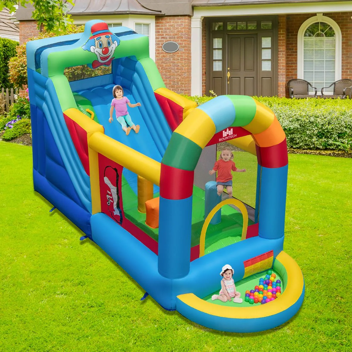 Clownland Bouncy Castle with Climbing Surface and Long Slide - Image 2